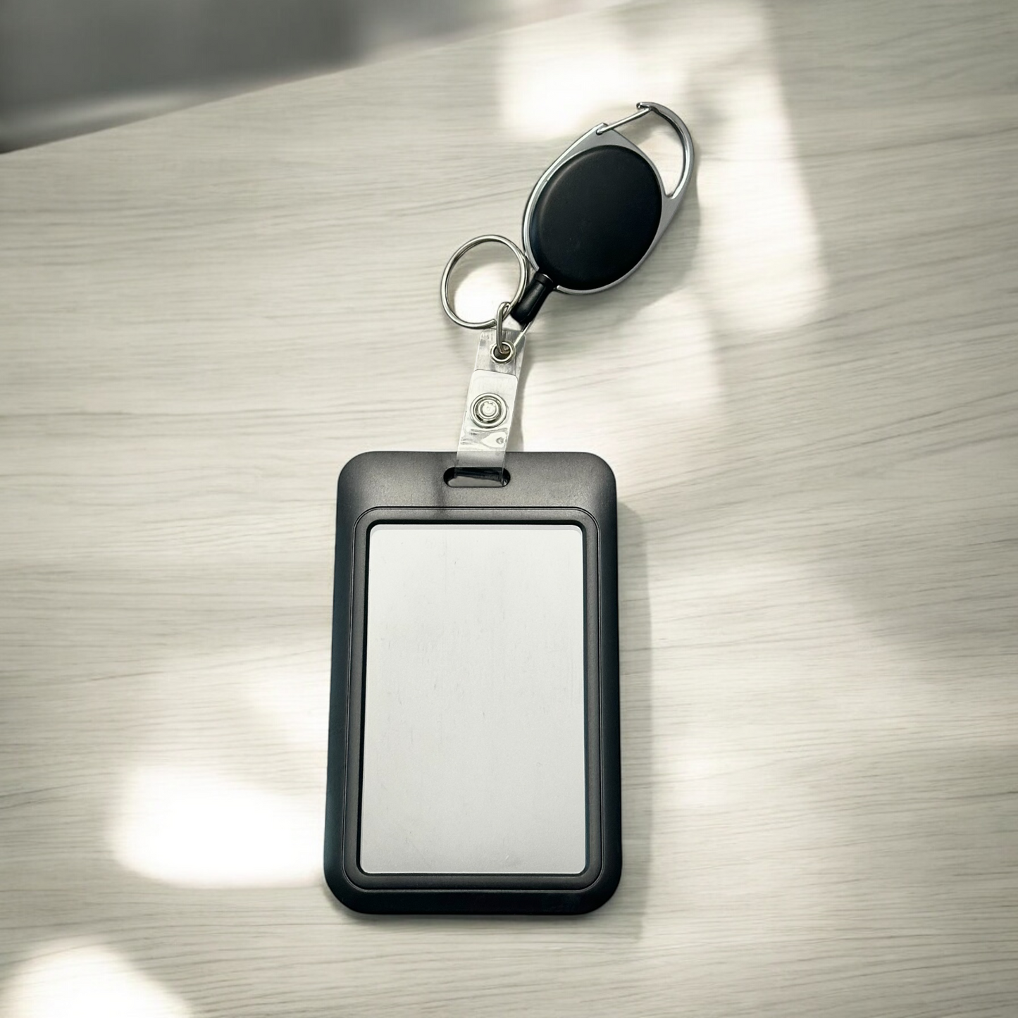 RETRACTABLE BADGE HOLDER