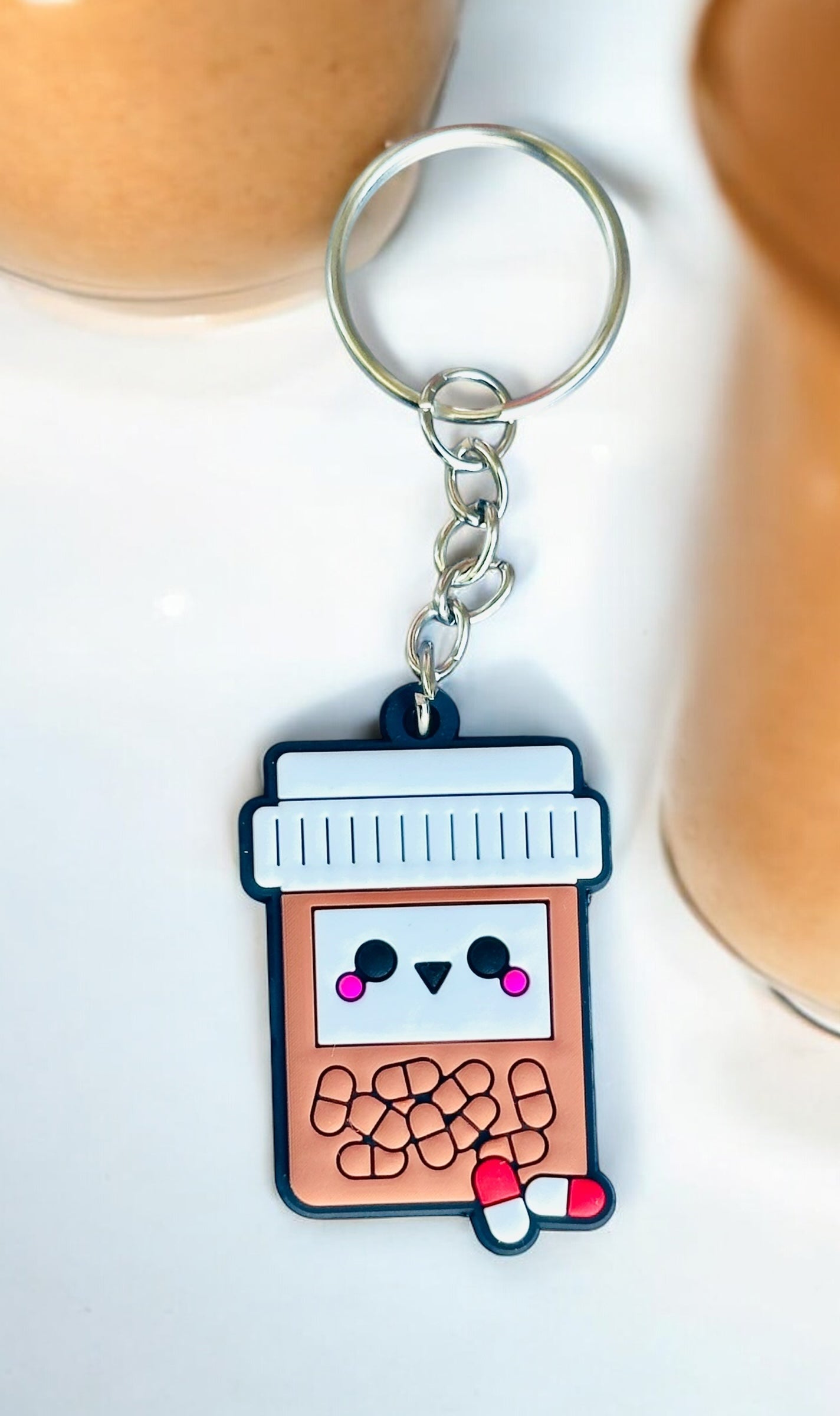 CUTE CARTOON PILL BOTTLE KEYCHAIN