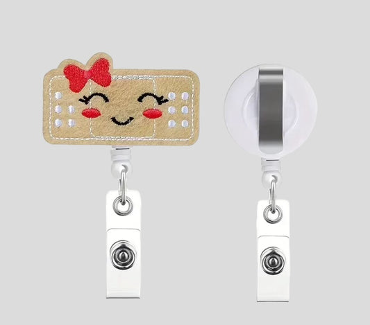 CUTE BAND-AID BADGE REEL